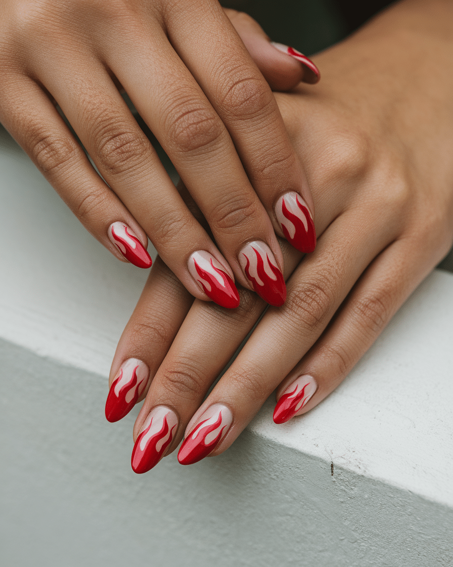 0004_2_a-still-image-of-a-beautiful-hand-with-n_IVAcoqfTReWP5WBy0QTOTg_0cPinjqqRTSEbZJ-l9HtMg_cover The Power of Red: Why Red Nails Will Always Be the Ultimate Beauty Statement
