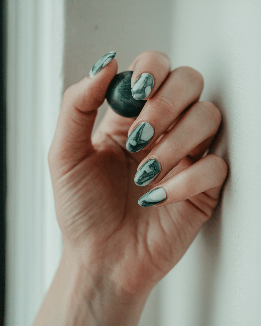 a-still-shot-of-a-hand-with-nails-made-o_-M9_bVpZQDOOwgog8GOwYQ_Tff_WyMjSyi_z9j25JA_wQ 10 Gorgeous and Easy Pink and Black Nail Art Ideas