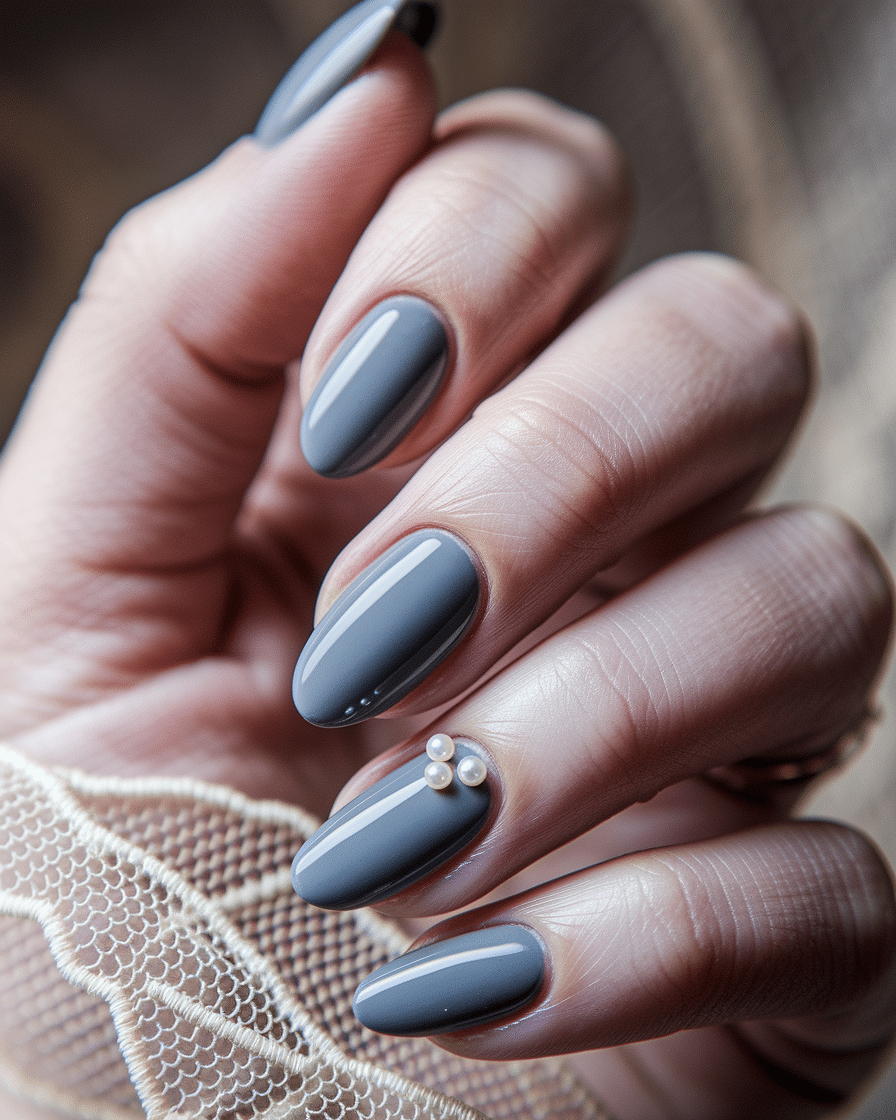 0004_2_a-close-up-photograph-captures-the-exqui_YB6F6NtyTRmpsN62BU_G2w_c-Ar8hv_RgGdCJyMKS1BcQ_cover Elegant Nail Designs with Grey Tones for a Birthday-Ready Manicure