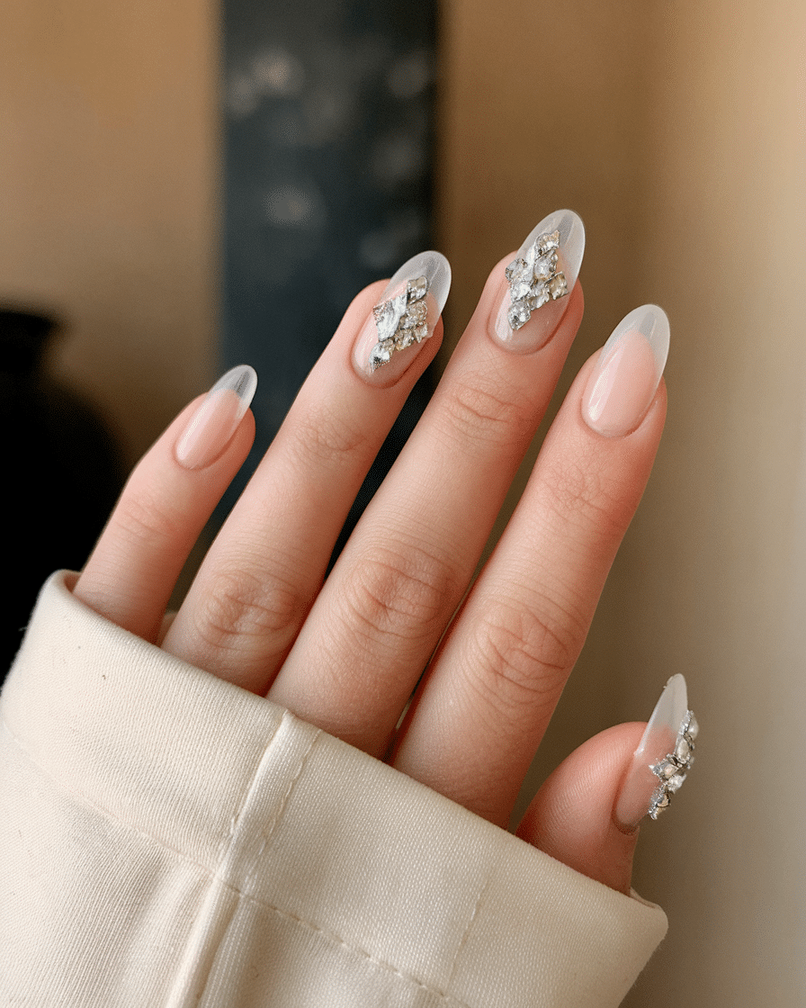 0010_2_a-still-of-a-beautiful-hand-with-nails-o_Ism33BTIQH2NpPHKfxa_xw_mZ6WZJL1Rg67_mn1wbFHuw Shine Bright This Spring: The Sparkle Manicure Revival We’re Obsessed With