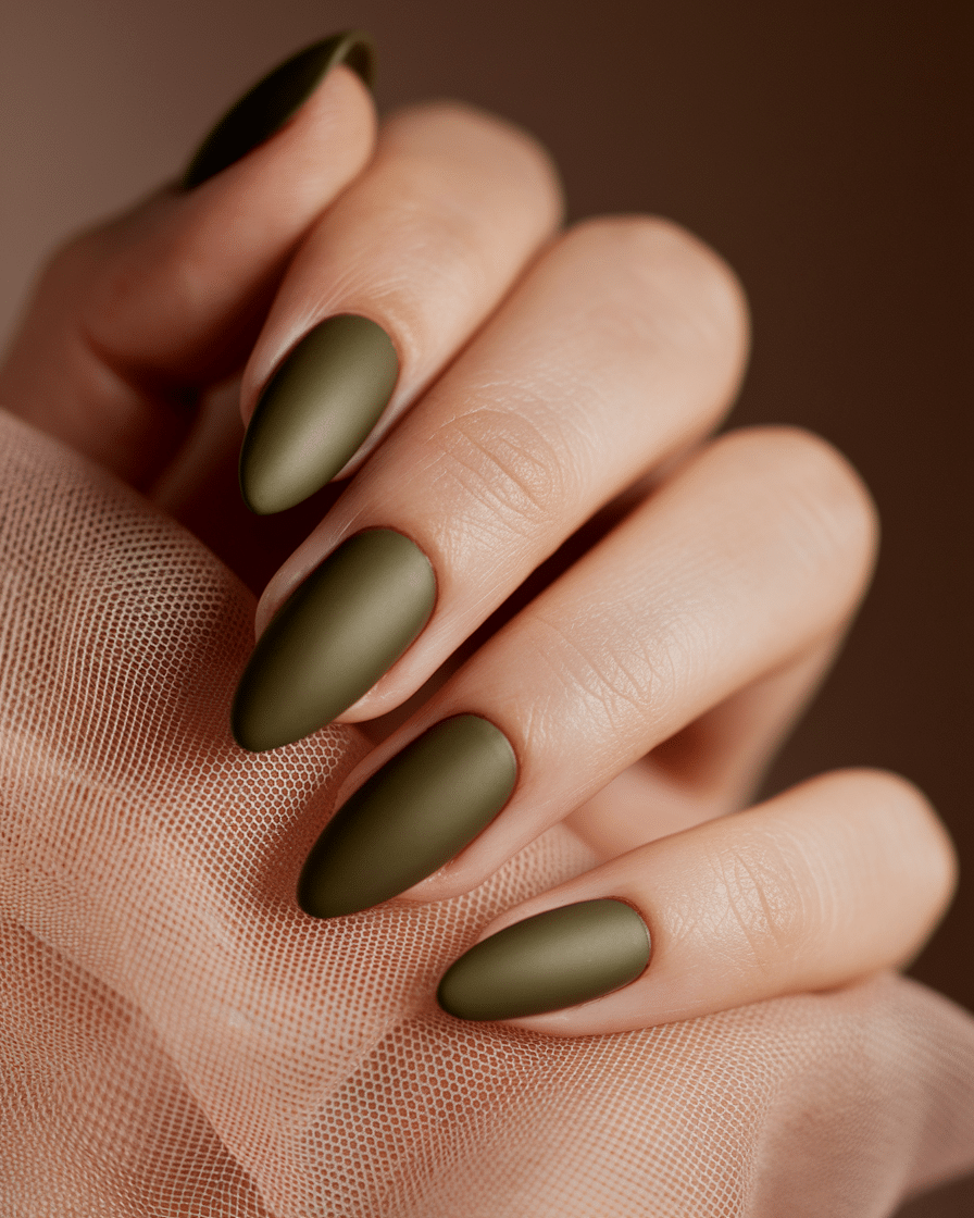 0015_1_a-close-up-photograph-of-a-beautifully-m_WnVFnXkCQc6sipEM1v0UTA_LTIshJD9QDO4OGvuC1VfzQ_cover The Underrated Elegance of Olive Green Nails: A Sophisticated Neutral for Every Season