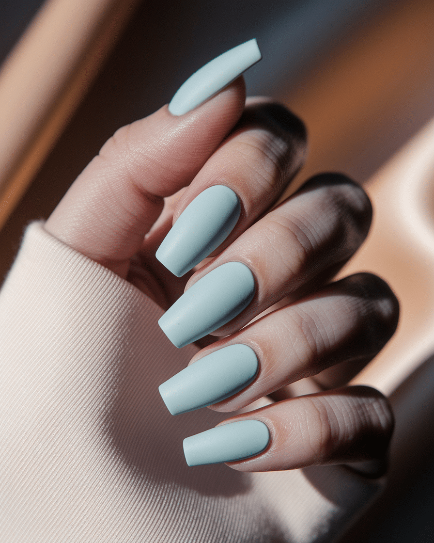 0017_3_a-close-up-photograph-captures-the-delic_sgXvo8aEQ2KPEkfA0tjgZQ_Ritp3GStTYKyFZni2L8vqQ_cover Light Blue Nail Designs for a Soft and Timeless Manicure Look