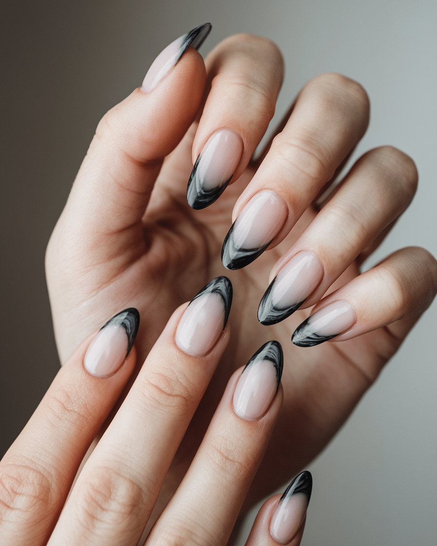 0019_1_a-still-of-a-hand-with-classic-french-na_b8qDVj-GS5yHNPtdm4dsrg_eQsLEkSaQfiG2R4ZPcvIZA The Timeless Allure of Black and Gray Nails