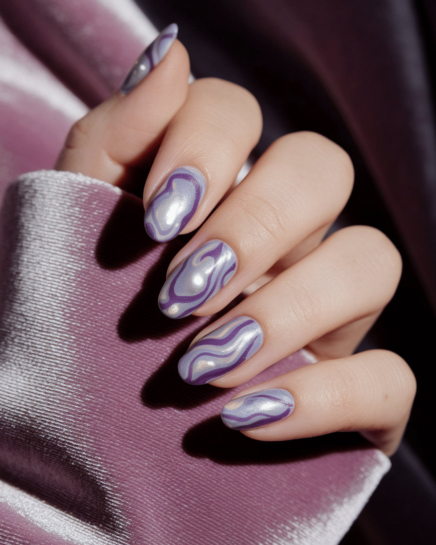 0007_1_a-close-up-photograph-of-a-hand-with-nai_7fbE8qseSZWcq1vE2ePywA_8Cn7nchDTvWSsN7K8jp38A_cover Magical Purple Nail Designs That Feel Straight Out of a Dream