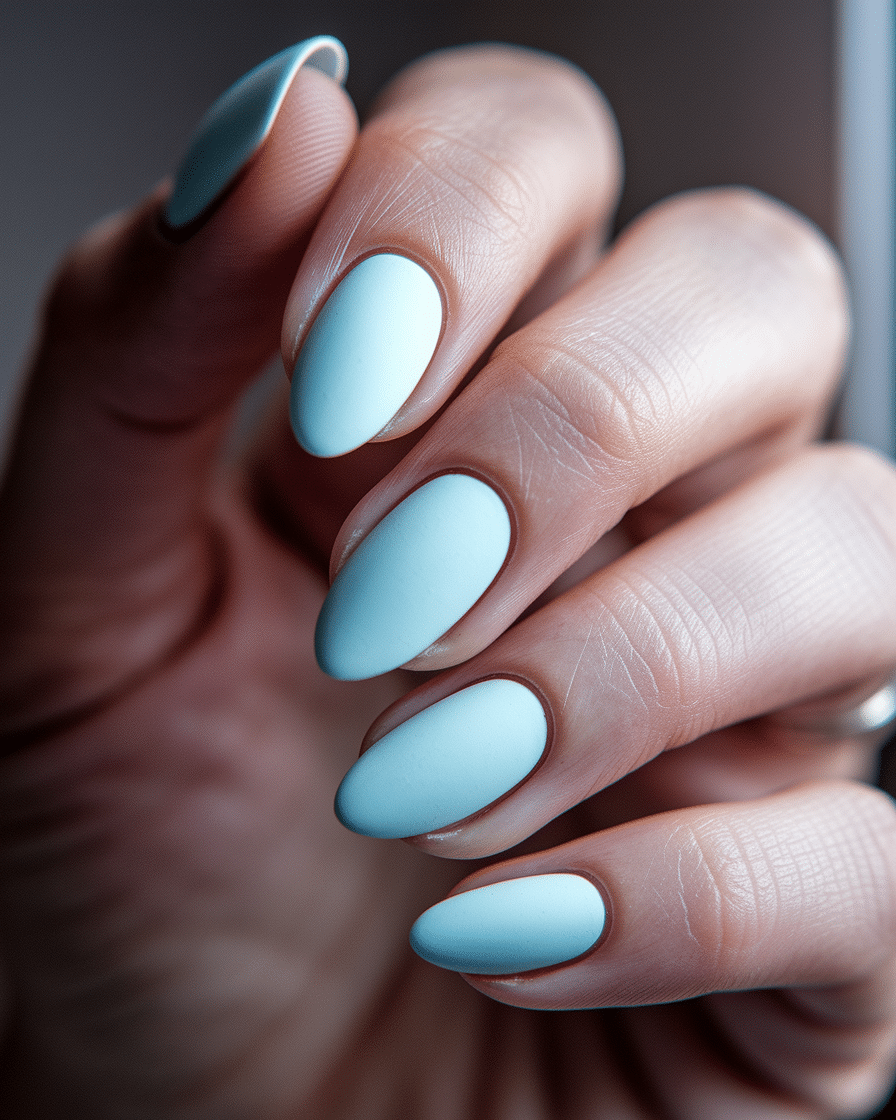 0008_2_a-close-up-photograph-captures-the-elega_ld77NoYgRZKskJUiVYC85A_aOqpzntTRXGabOQJ-K2yRA_cover The Ultimate Guide to Blue Nail Designs That Always Stay in Style