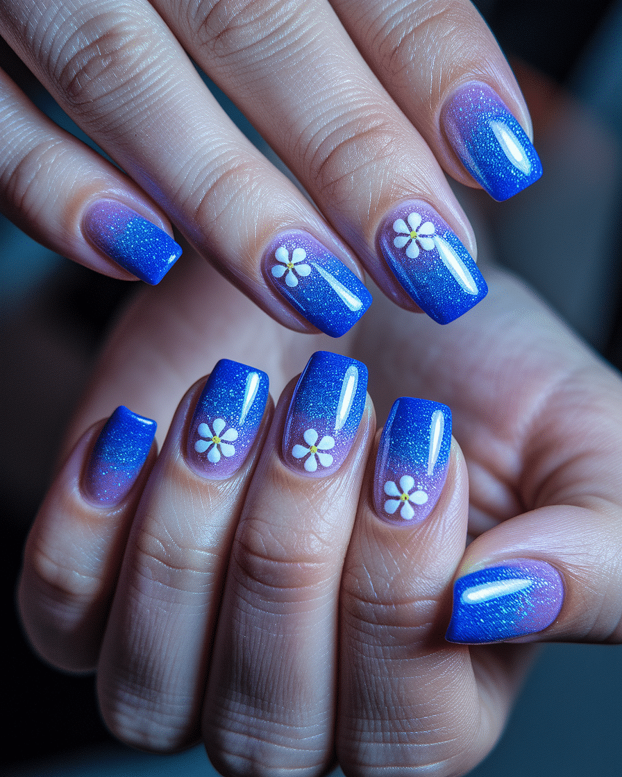 0001_2_in-a-stunning-photograph-a-close-up-view_p-ljFjUqStGkxB4GcGcyZQ_C5SItybRTli2b62jIp4iCQ Elegant Floral Nail Designs in Blue for a Modern and Fresh Manicure